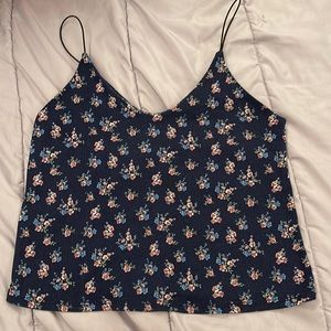 Size medium good used condition dark blue with floral print.
